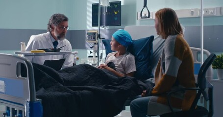 Canvas Print - Doctor telling good news to boy and woman