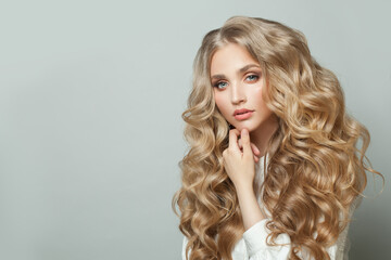 Wall Mural - blonde beauty. young perfect woman with long healthy shiny hair on white background. hair model port