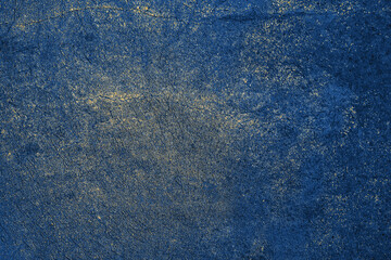 dark blue texture with gold cracks. abstract background.