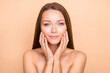 © deagreez - Portrait of pretty dreamy girl touching pure skin domestic pamper daily care isolated over beige pastel color background