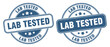 lab tested stamp. lab tested label. round grunge sign