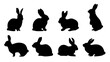 Set of Easter bunny silhouettes looking up, standing and sitting. Outline rabbits shadow in profile. Vector illustration isolated on white background collection