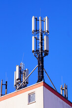 Cellular Antennas On A Roof In Oberursel, Germany.