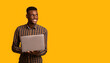 © Prostock-studio - Remote job for students. Portrait of happy young black guy with laptop