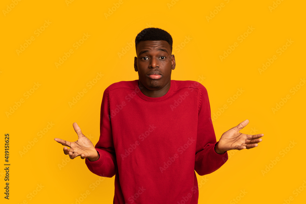I Don't Know. Doubtful African American Guy Shrugging Shoulders And Spreading Arms - obrazy, fototapety, plakaty 