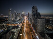 © AmazingAerialAgency - Aerial view of Sheikh Zayed road in Dubai city centre, a busy and large traffic road in Dubai downtown running among tall skyscrapers at night, Dubai, United Arab Emirates.