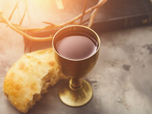 Chalice Of Wine And Bread On Grunge Background