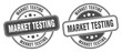 © Aquir - market testing stamp. market testing label. round grunge sign