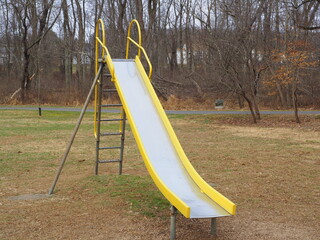 The sliding board is trimmed in yellow.