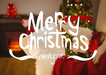 Sticker - Merry christmas everyone text over santa claus writing letter in background