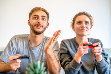 Caucasian couple playing video games. Palma de Mallorca, Spain