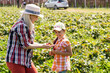 © Angelov - Beautiful young caucasian mother with her daughter pick strawberries in the field