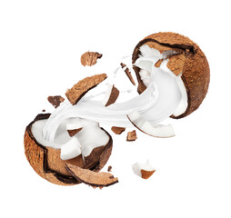 Wall Mural - Coconut broken in the air into two halves with milk splashes, isolated on a white background