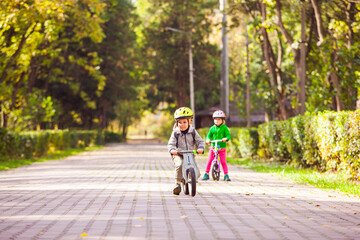 Wall Mural - Kids striving to win while cycling competition