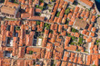 © davidzzzfr - Aerial overhead drone shot of resident houses Dubrovnik old town inside city wall in Croatia summer