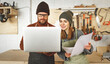 © JenkoAtaman - Artisan coworkers working with laptop in joinery workshop