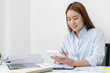 © Puwasit Inyavileart - Accounting businesswomen are calculating income-expenditure and analyzing real estate investment data, Dedicated to the progress and growth of the company, Financial and tax systems concept.