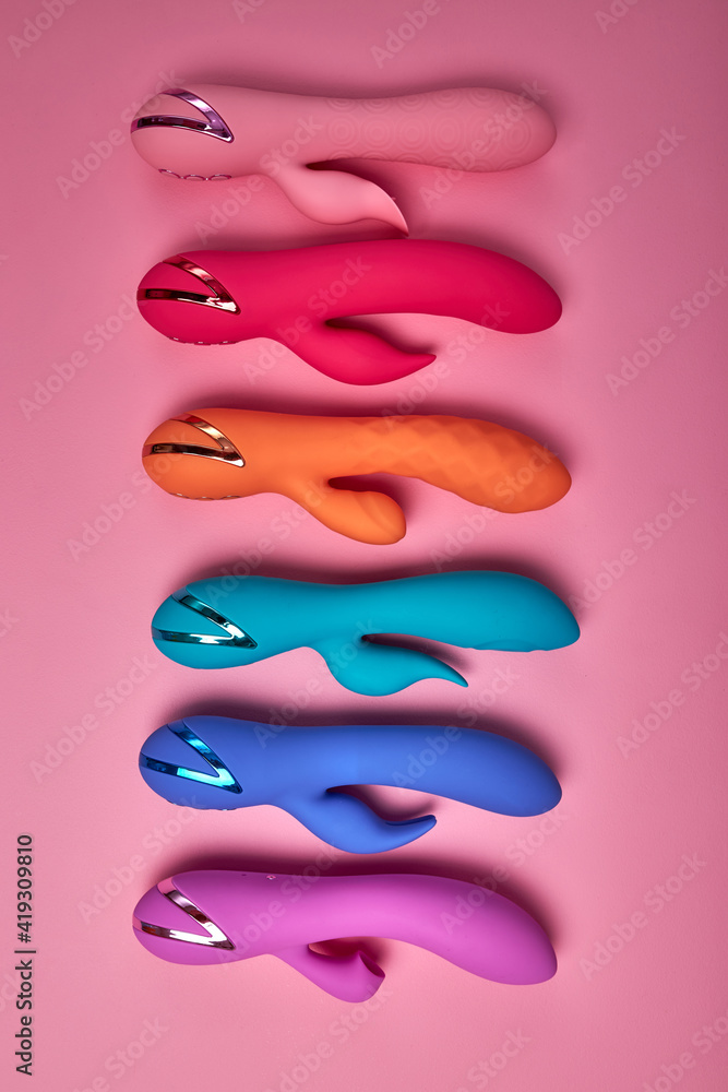 Flat lay colourful silicone G-spot vibrator dildos for women on pink background, many dildos in row, just for pleasure and fun. private intimate life. sex concept Stock-foto | Adobe Stock Flat lay colourful silicone G-spot vibrator dildos for women on pink background, many dildos in row, just for pleasure and fun. private intimate life. sex concept Stock-foto | Adobe Stock