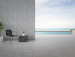 Chair on terrace near swimming pool in modern beach house or luxury villa. Concrete deck 3d rendering with sea view.