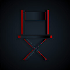 Poster - Paper cut Director movie chair icon isolated on black background. Film industry. Paper art style. Vector.