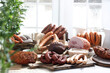 Rustic composition of homemade, smoked cold cuts, meats, sausages, hams, loins.