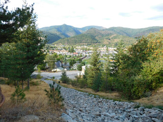 a rocky artificial riverbed leads to the north side of kellogg, idaho. fed by melting snow in the sp