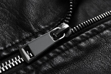 Closeup View Of Black Leather Jacket With Zipper As Background