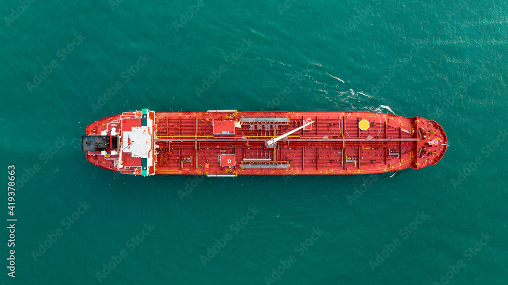 Aerial Top view of oil tanker ship sailing on open sea. Crude oil tanker lpg ngv at industrial estate Thailand - Oil tanker ship to Port of Singapore - import export