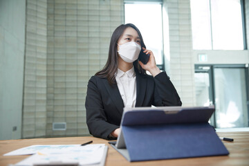 Wall Mural - Asian woman in the office