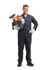 Wall Mural - Full length portrait of a janitor holding a bucket with cleaning supplies