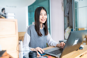 smiling business casual women use laptop computer connection