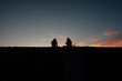 © Erik Witsoe/Wirestock - Silhouette of female friends in nature