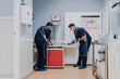 © Alberto Ortega/ADDICTIVE STOCK - Unrecognizable male veterinarians in uniforms and respiratory masks curing animal patient lying on table in hospital