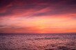 © Javier Martinez/ADDICTIVE STOCK - Breathtaking view of vibrant sundown sky over wavy sea in evening in Cadiz