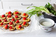 © Leire Gamboa/ADDICTIVE STOCK - From above of yummy appetizers with fresh eggplants mozzarella whole cherry tomatoes olive oil and onion
