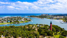 Jupiter Is A Town On The Southeastern Coast Of Florida. On A Hill Overlooking The Loxahatchee River, The Red 1860 Jupiter Inlet Lighthouse Offers Panoramic Views. The Site Also Has A Preserved Pioneer