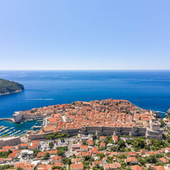 Wall Mural - Aerial drone shot of City Walll Dubrovnik by Adriatic sea in Croatia summer noon