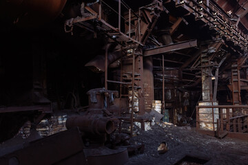 Wall Mural - Old rusty abandoned metallurgical plant. Ruined blast furnace