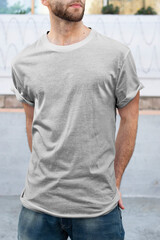 Wall Mural - Man wearing minimal gray t-shirt fashion apparel outdoor shoot