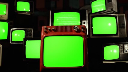 Wall Mural - many vintage televisions turning on green screens. you can replace green screen with the footage or 