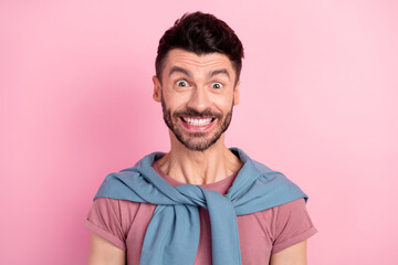 Sticker - Photo of happy cheerful positive young man excited sale news isolated on pastel pink color background