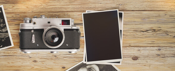 Photo album remembrance and nostalgia in summer journey trip on wood table. instant photo of vintage camera - vintage and retro style