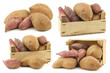 mixed sweet potatoes in a wooden crate on a white background
