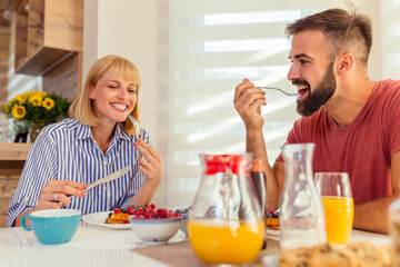 Canvas Print - Couple having breakfast