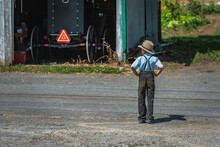 Amish Boy On Road