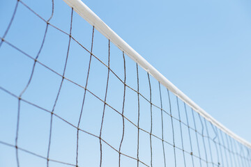 volleyball or tennis net on a background of blue sky