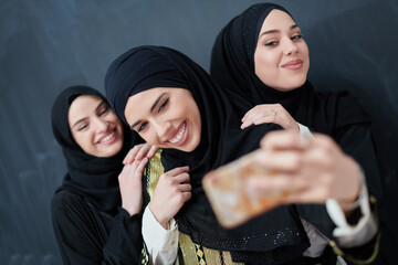 Wall Mural - Portrait of Arab women wearing traditional clothes or abaya