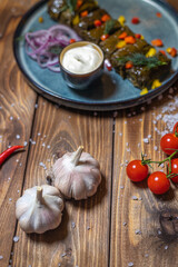 Wall Mural - Garlic, cherry tomatoes, chili peppers and other dishes.