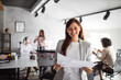 © bnenin - Another people, colleagues working in the background.