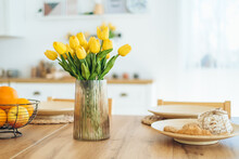 Yellow Tulips In A Vase On The Table. Spring Holiday, Easter, Home Decor.